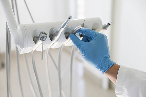 Professional Tooth Extraction technician working in Panama City, FL